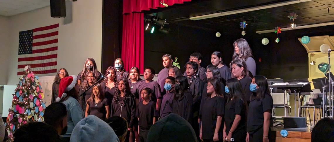 Alamitos’ Choir led by Mrs. Gutaskus performing at our Winter Concert